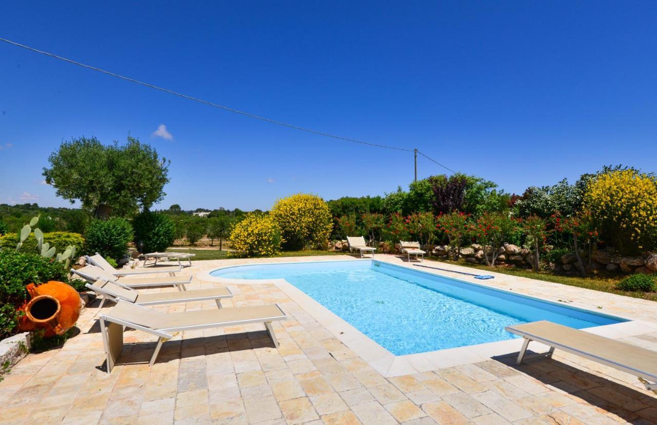 Terra Sessana Ville E Trullo Con Piscina Privata ออสตูนี ภายนอก รูปภาพ