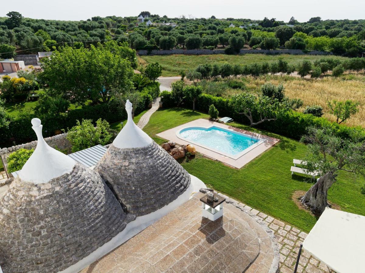 Terra Sessana Ville E Trullo Con Piscina Privata ออสตูนี ภายนอก รูปภาพ